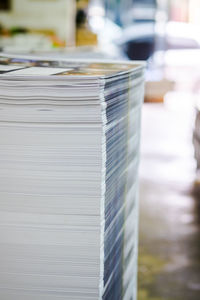 Close-up of stacked newspapers