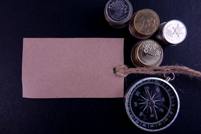 High angle view of coins on table