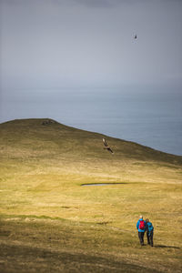 Hikers at coast