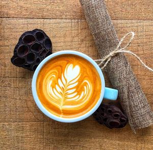 High angle view of cappuccino on table