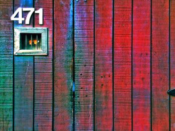 Number 471 on old wooden door