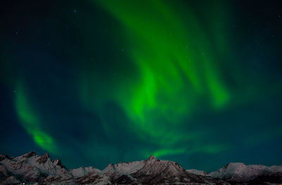 Low angle view of mountain against sky at night