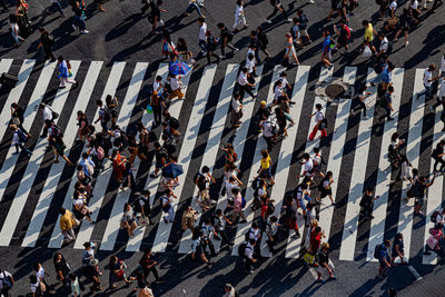 High angle view of people walking on street