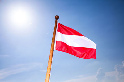 Low angle view of flag against sky