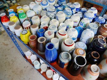 High angle view of multi colored crockery or rack