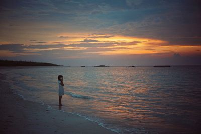 Scenic view of sea at sunset