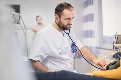 Doctor standing in office