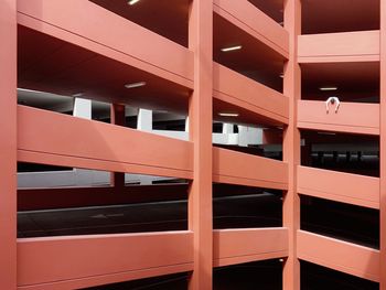 Young man leaning on building balcony