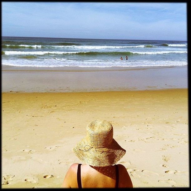 sea, beach, horizon over water, sand, shore, water, sky, tranquil scene, tranquility, scenics, beauty in nature, vacations, nature, relaxation, wave, idyllic, one person, summer, coastline, sunlight