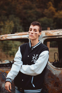 Portrait of teenage girl standing outdoors