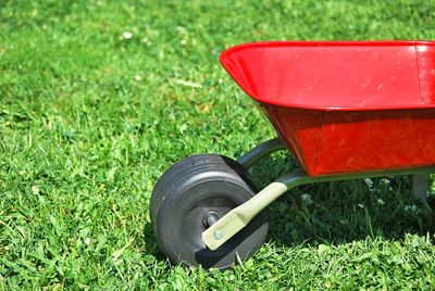 High angle view of wheelbarrow on field