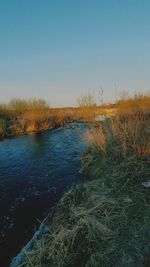 Scenic view of land against clear sky