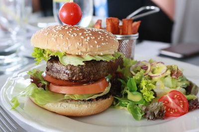 Close-up of burger in plate on table