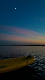 Scenic view of calm sea at sunset