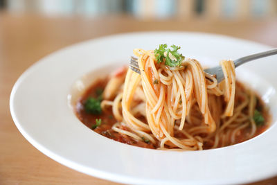 Close-up of noodles served in plate