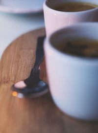 Close-up of coffee cup on table