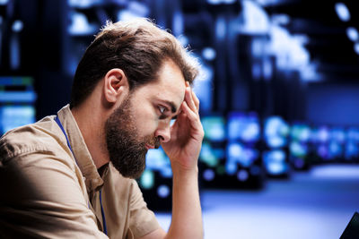 Close-up of young man looking away