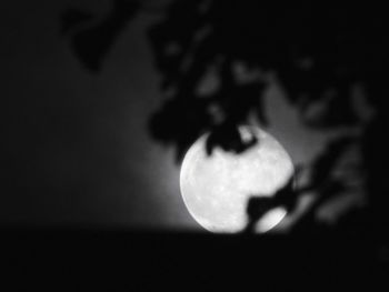 Close-up of illuminated moon against sky