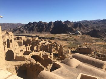 Panoramic view of mountains against clear sky