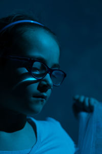 Close-up of boy wearing eyeglasses