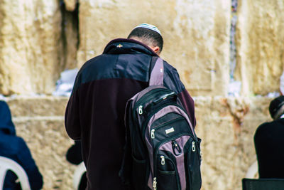 Rear view of man standing outdoors