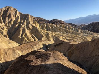 Scenic view of mountains against clear sky