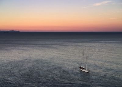 Scenic view of sea at sunset