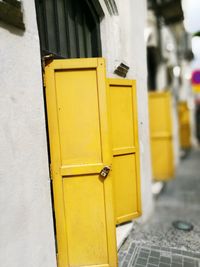 Close-up of yellow mailbox