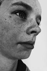 Close-up portrait of a serious young woman