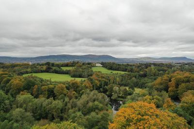 Scenic view of landscape against sky during autumn