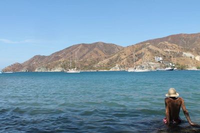 Scenic view of sea and mountains