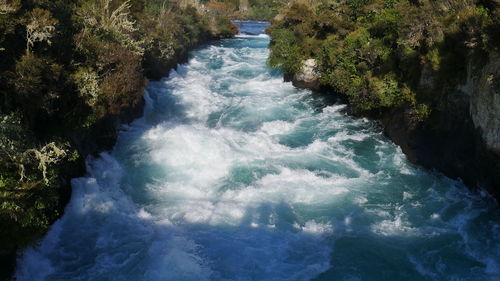 High angle view of waterfall in sea