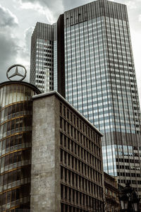 Low angle view of modern buildings against sky