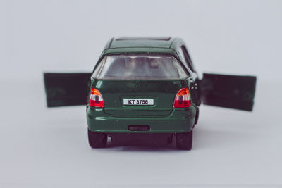 Close-up of toy car against white background