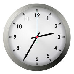 Low angle view of clock on wall