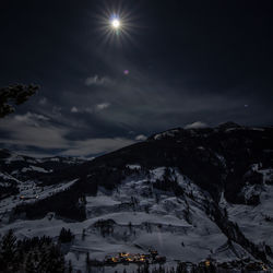 Scenic view of landscape against sky during winter