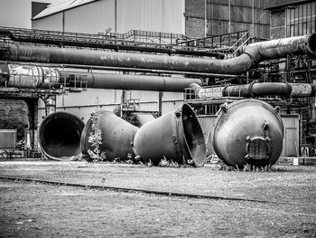 Abandoned and factory in field