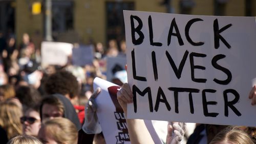 Group of people on street in city
