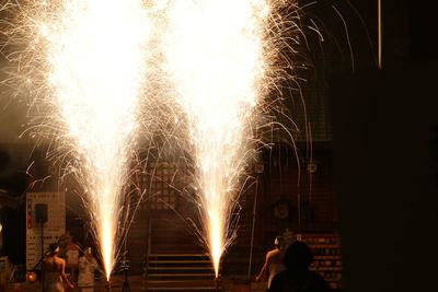 Firework display at night