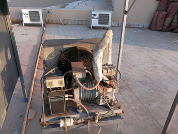 High angle view of old rusty air conditioner