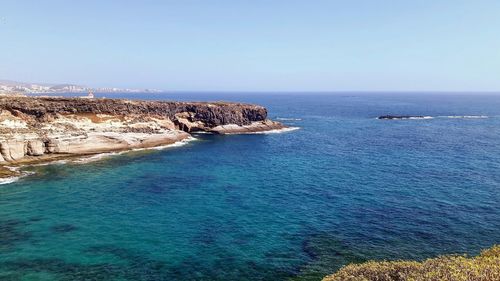 Scenic view of sea against clear sky