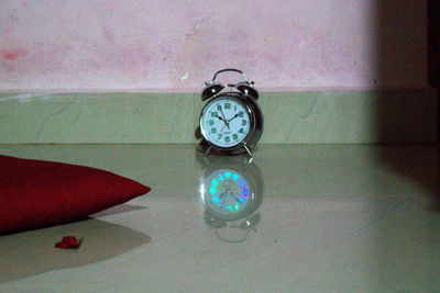 High angle view of clock on table at home