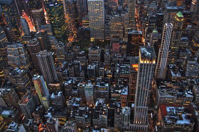 Full frame shot of illuminated cityscape at dusk