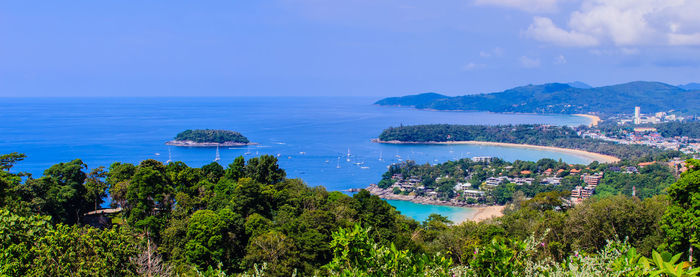 Scenic view of sea against blue sky