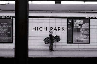 Text on glass of subway station