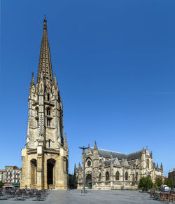 View of historical building against clear blue sky