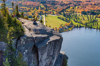 High angle view of stream amidst trees during autumn