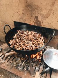 High angle view of meat on barbecue grill