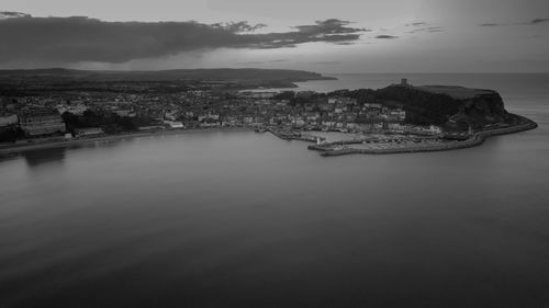 Aerial monochrome image of scarborough coastline from the sea.