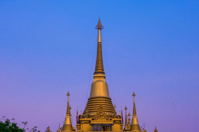 Low angle view of building against blue sky